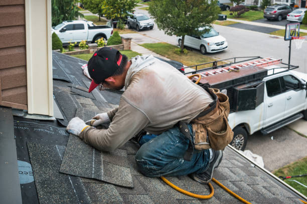 Professional Roofing technician working in Doylestown, PA